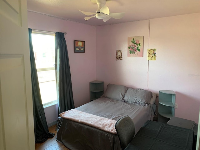 3380 Maple Ter, Port Charlotte, FL 33952 - bedroom with wood finished floors and a ceiling fan