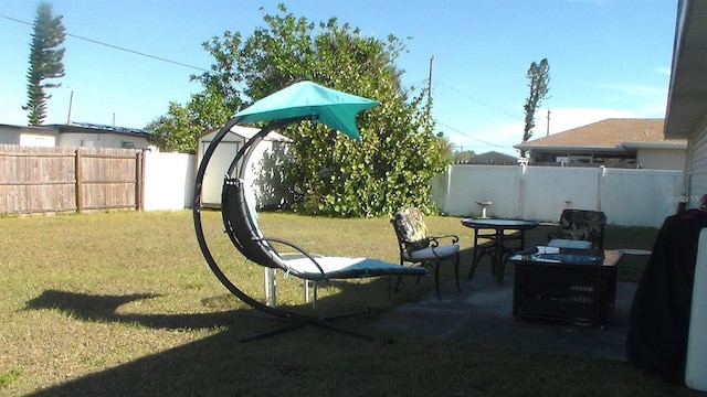 3380 Maple Ter, Port Charlotte, FL 33952 - exterior space with a fenced backyard and a yard