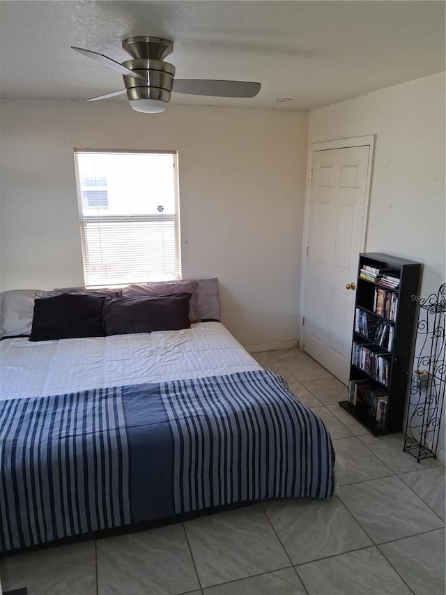 3380 Maple Ter, Port Charlotte, FL 33952 - bedroom featuring tile patterned flooring and a ceiling fan