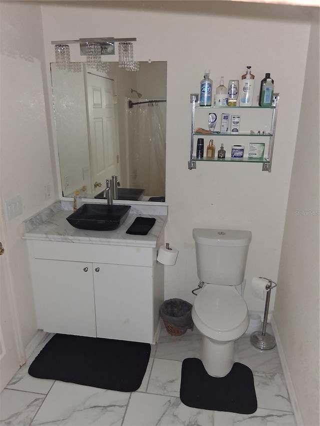 3380 Maple Ter, Port Charlotte, FL 33952 - full bath featuring marble finish floor, toilet, curtained shower, and vanity