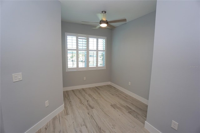 unfurnished room featuring ceiling fan and light wood-type flooring