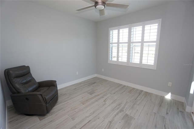 unfurnished room with ceiling fan and light hardwood / wood-style flooring