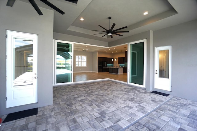 view of patio with ceiling fan