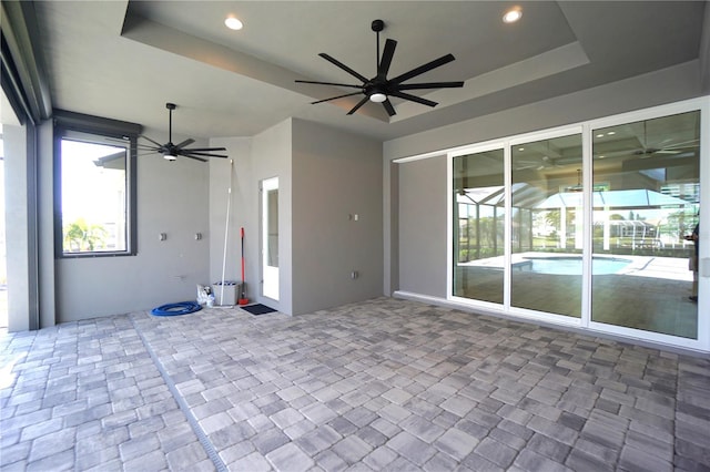 interior space featuring ceiling fan