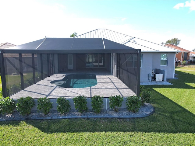 view of pool featuring a yard and a lanai