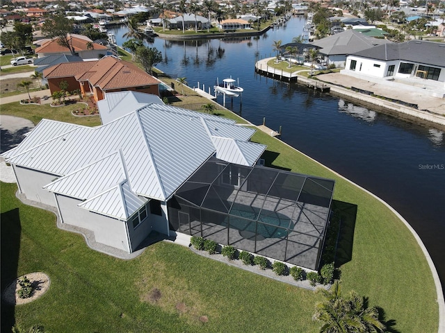 drone / aerial view featuring a water view