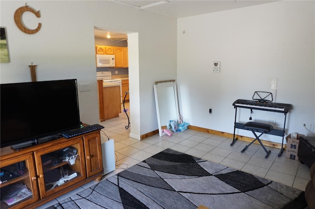 living room with light tile patterned flooring