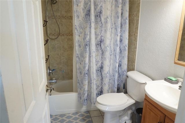 full bathroom featuring tile patterned flooring, vanity, toilet, and shower / bath combo with shower curtain