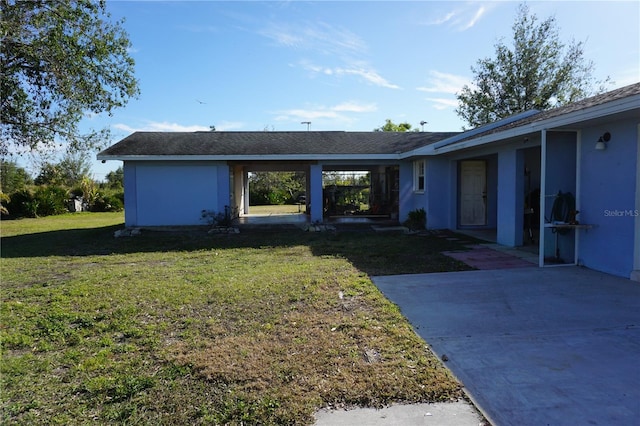 exterior space with a yard