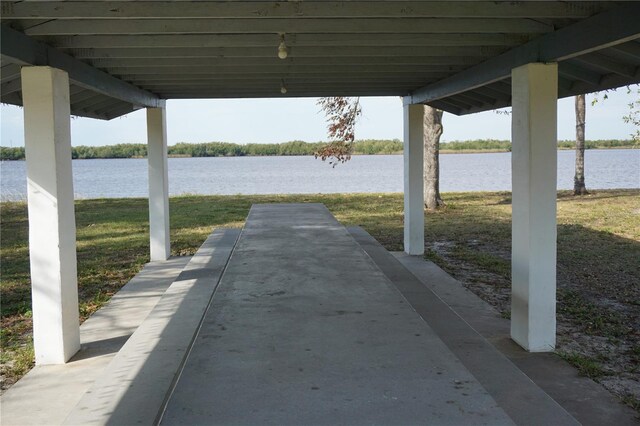 view of patio featuring a water view