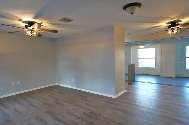 spare room featuring hardwood / wood-style flooring