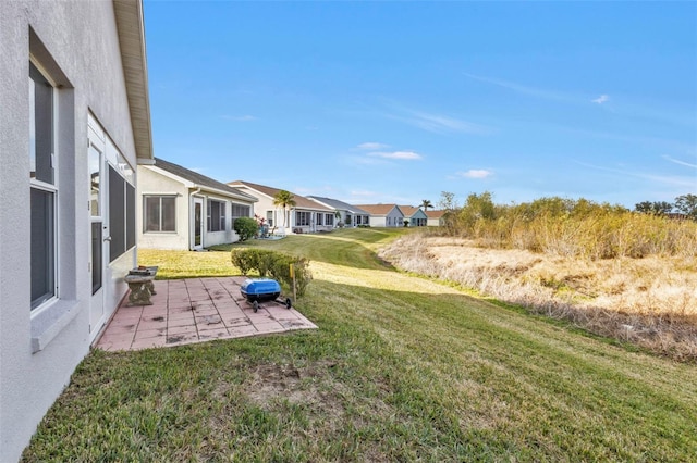 view of yard featuring a patio area