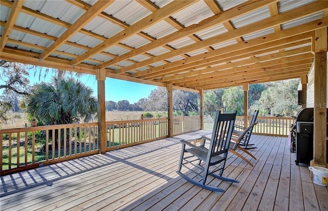 wooden terrace featuring grilling area