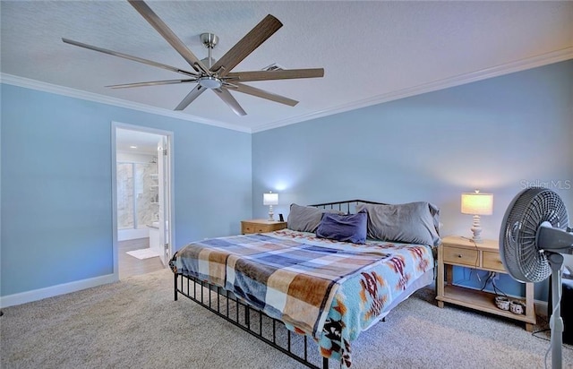 bedroom with connected bathroom, ornamental molding, ceiling fan, and carpet