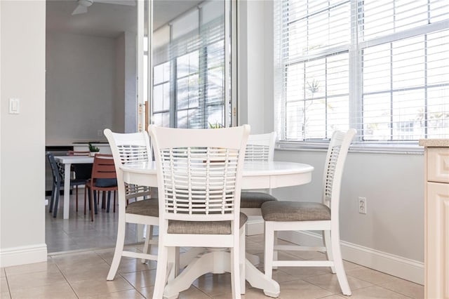 dining room with light tile patterned floors