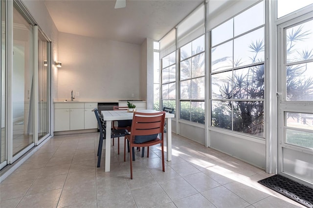 sunroom featuring sink