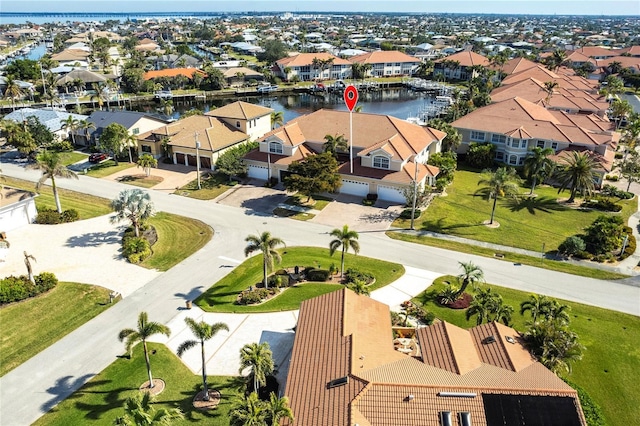 bird's eye view with a water view