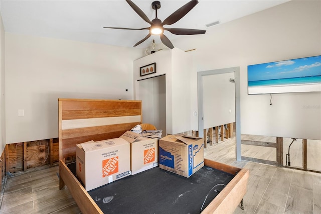 bedroom with hardwood / wood-style floors and ceiling fan