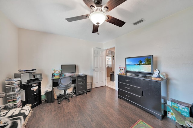 office area with ceiling fan and dark hardwood / wood-style flooring