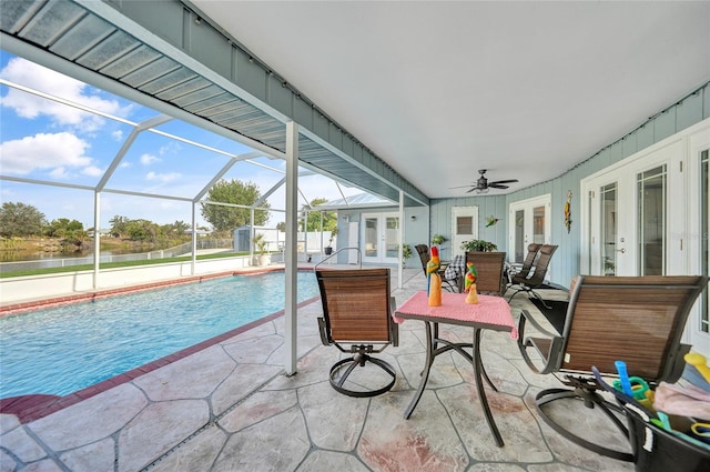 exterior space featuring a patio, a lanai, ceiling fan, and french doors