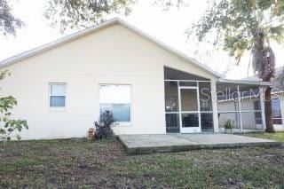 rear view of house with a patio area