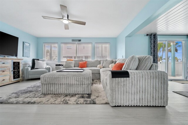 living room with ceiling fan