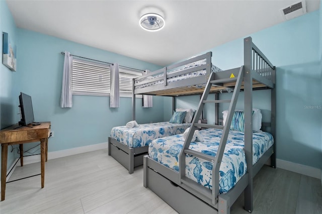 bedroom with light hardwood / wood-style flooring