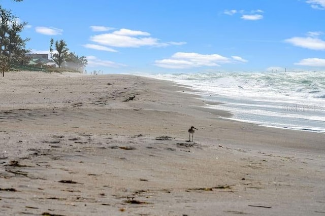 exterior space featuring a beach view