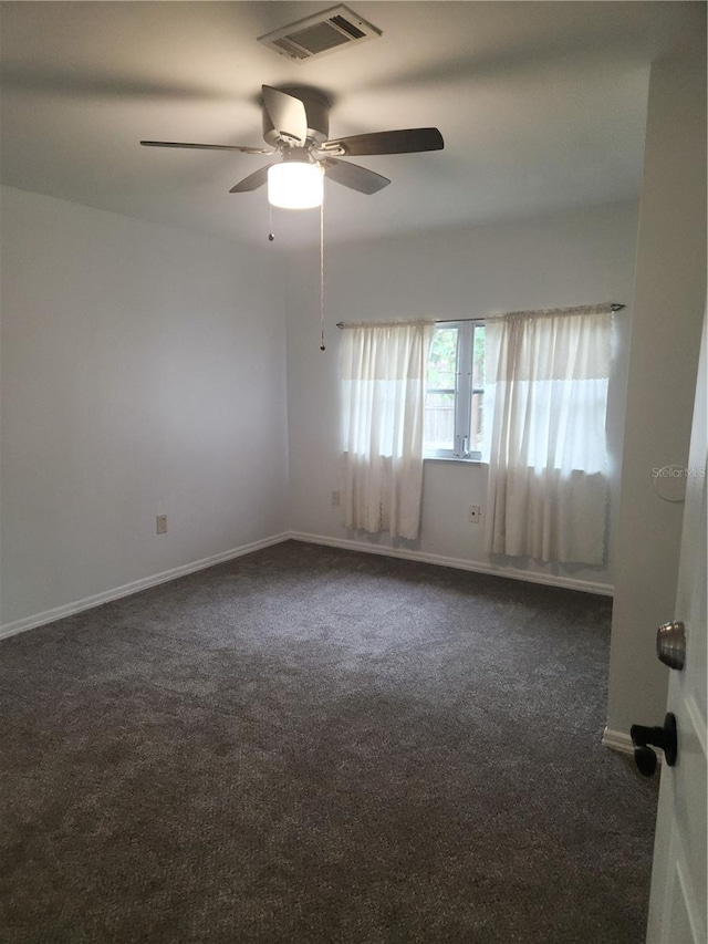 carpeted empty room with ceiling fan