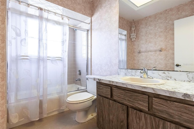 full bathroom with tile patterned flooring, vanity, tub / shower combination, and toilet