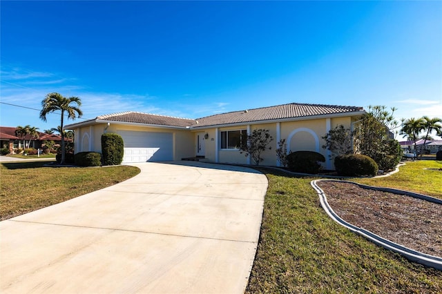 view of front facade with a garage and a front yard