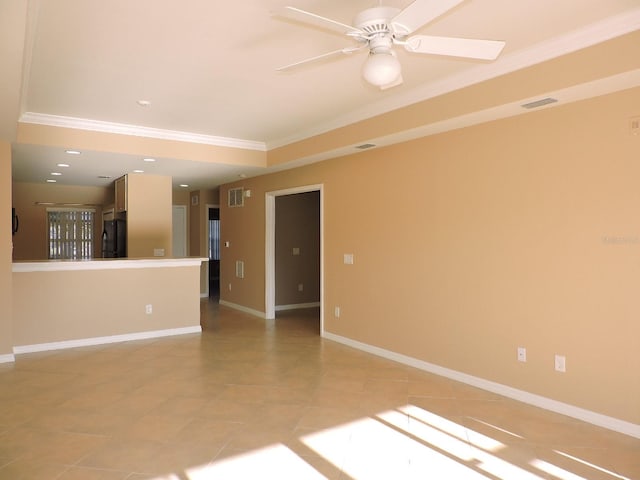 unfurnished room with crown molding, ceiling fan, and light tile patterned floors