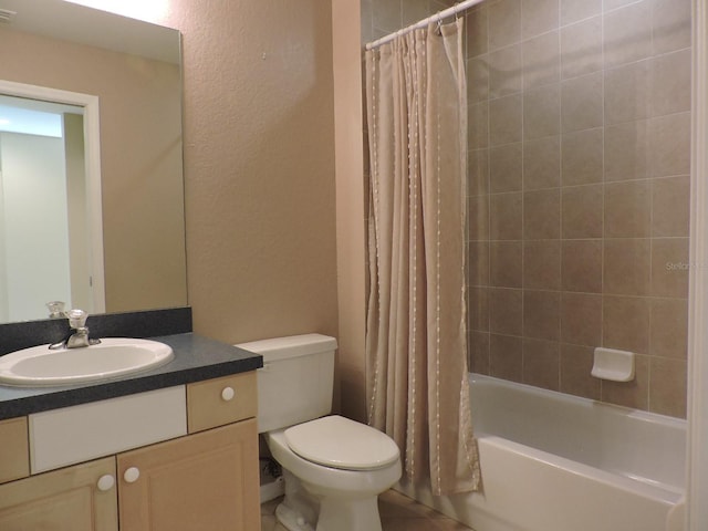 full bathroom with toilet, vanity, and shower / bath combo with shower curtain