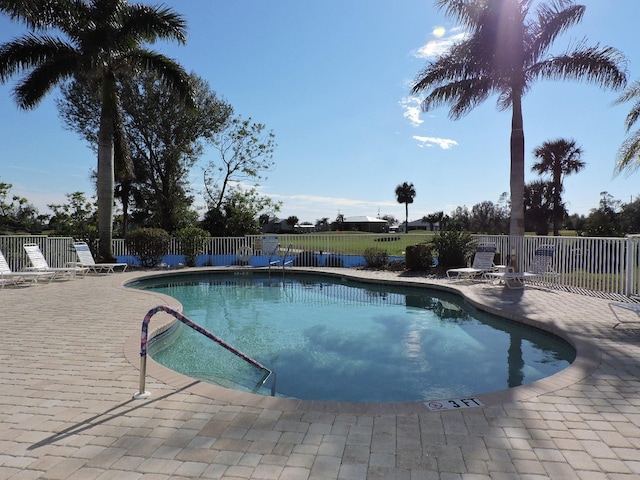 view of pool featuring a patio