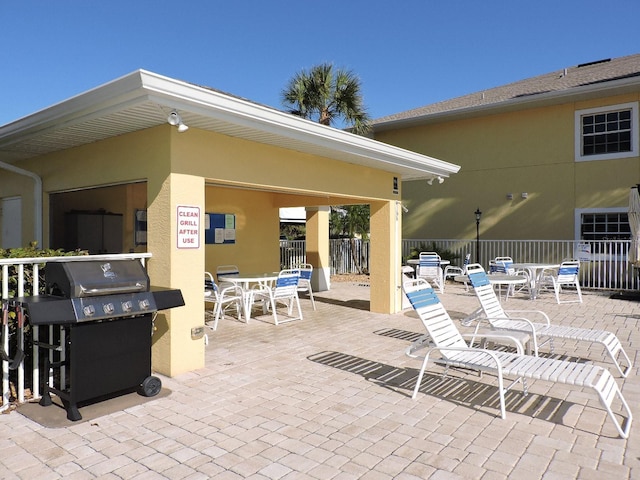 view of patio with a grill