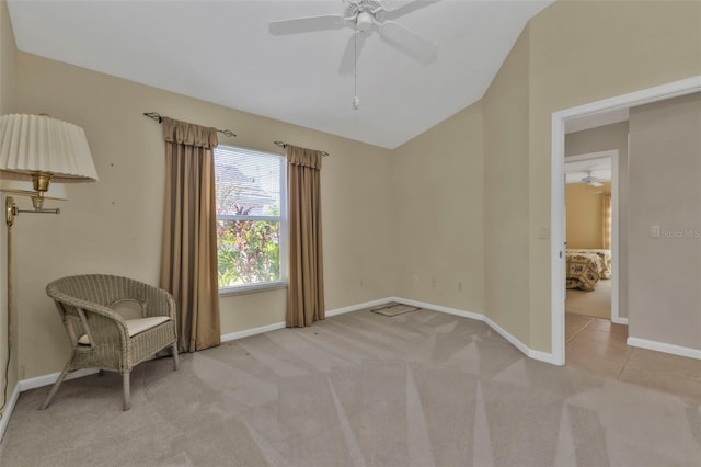 unfurnished room with lofted ceiling, light colored carpet, and ceiling fan