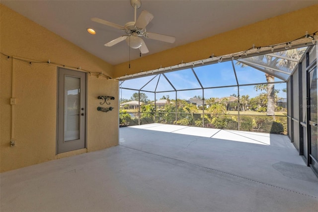 view of patio / terrace with a lanai and ceiling fan