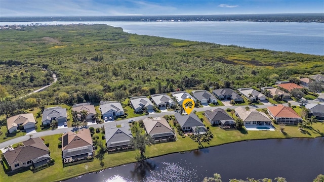 drone / aerial view with a water view