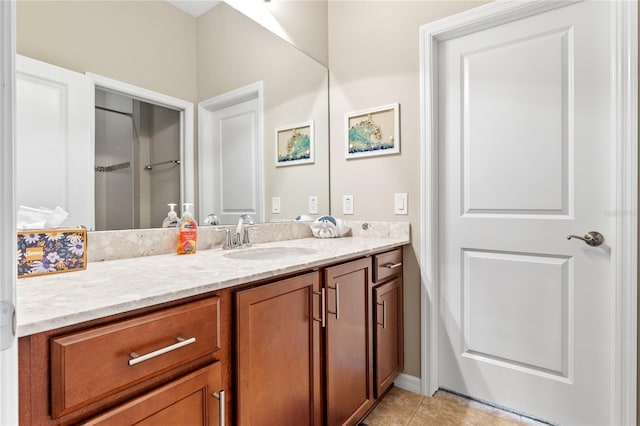 bathroom with vanity and tile patterned flooring