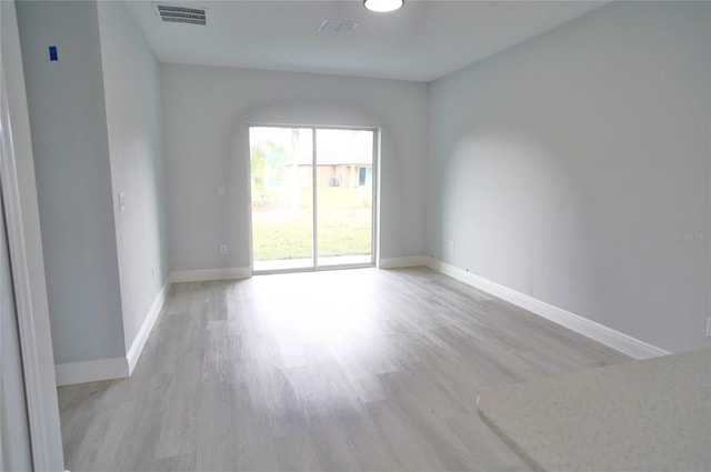 empty room featuring light hardwood / wood-style flooring