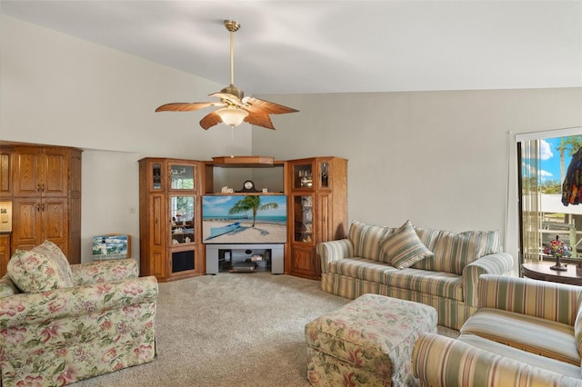 carpeted living room featuring lofted ceiling and ceiling fan