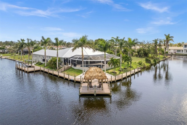 dock area with a water view and glass enclosure