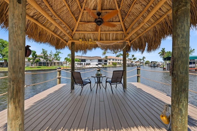 dock area featuring a gazebo and a water view