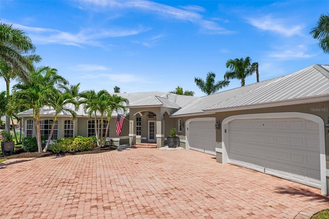 ranch-style home with a garage