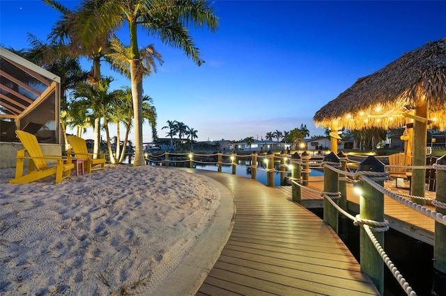 view of dock with a water view