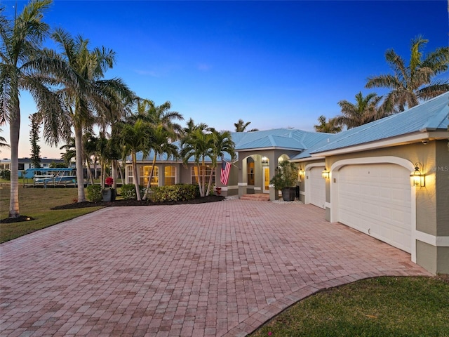 view of front of property featuring a garage