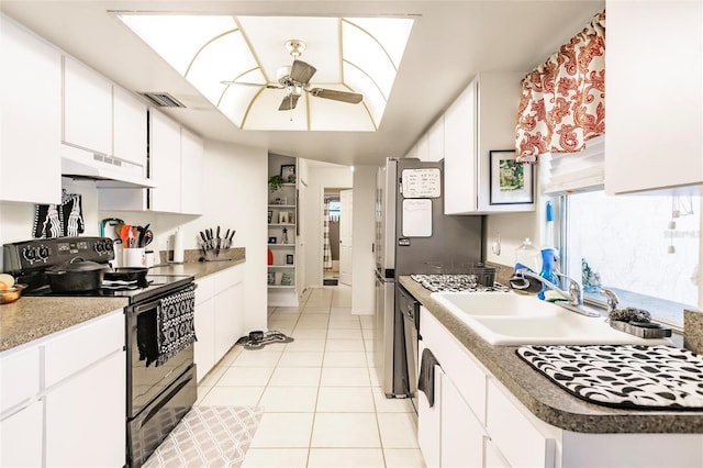 kitchen with white cabinetry, black electric range oven, sink, light tile patterned floors, and ceiling fan