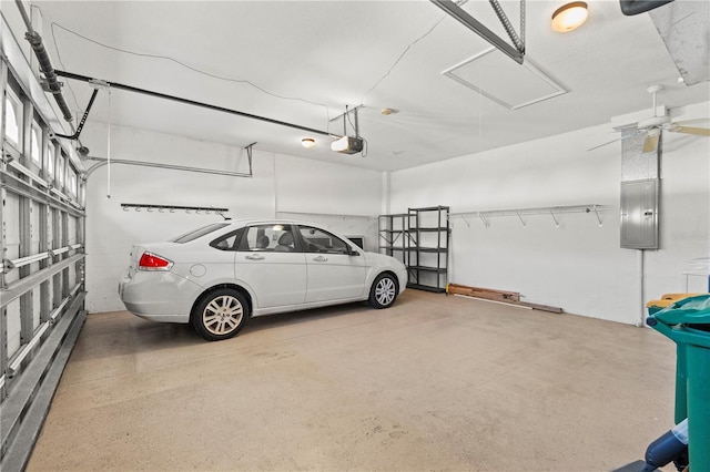 garage featuring a garage door opener and electric panel