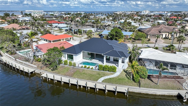 aerial view featuring a water view