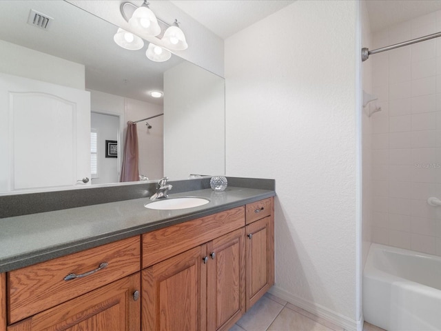 bathroom featuring vanity, tile patterned floors, and shower / tub combo with curtain